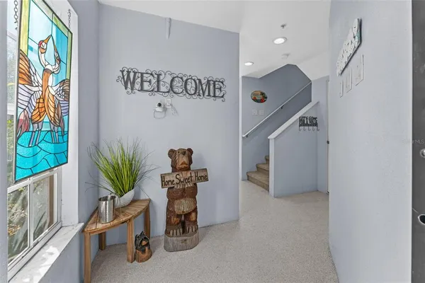 a view of a hallway with workspace