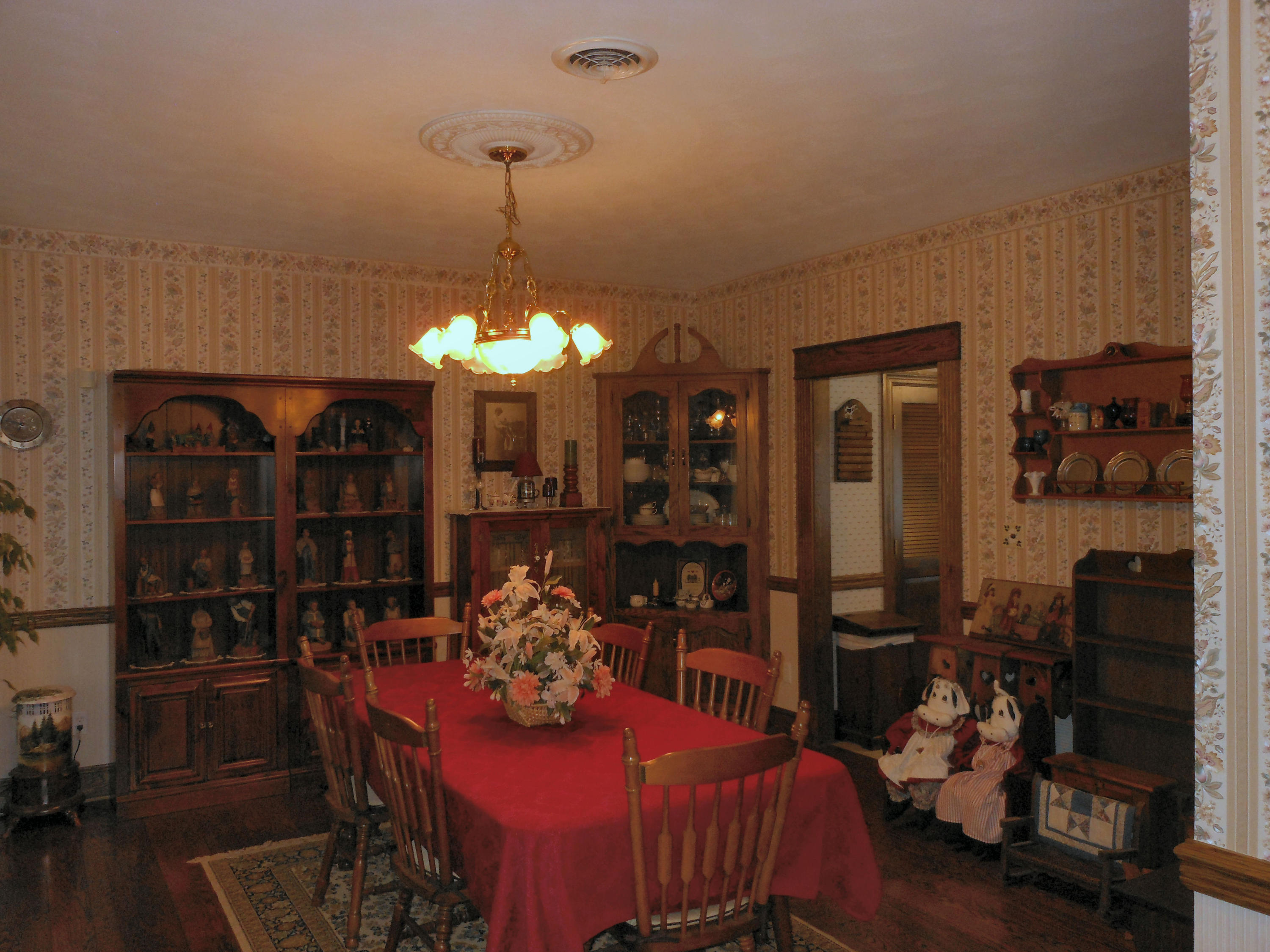 4019 Goodview Road Goodview, VA 24095 - Photo 16 of 47 a view of a dining room with furniture and wooden floor