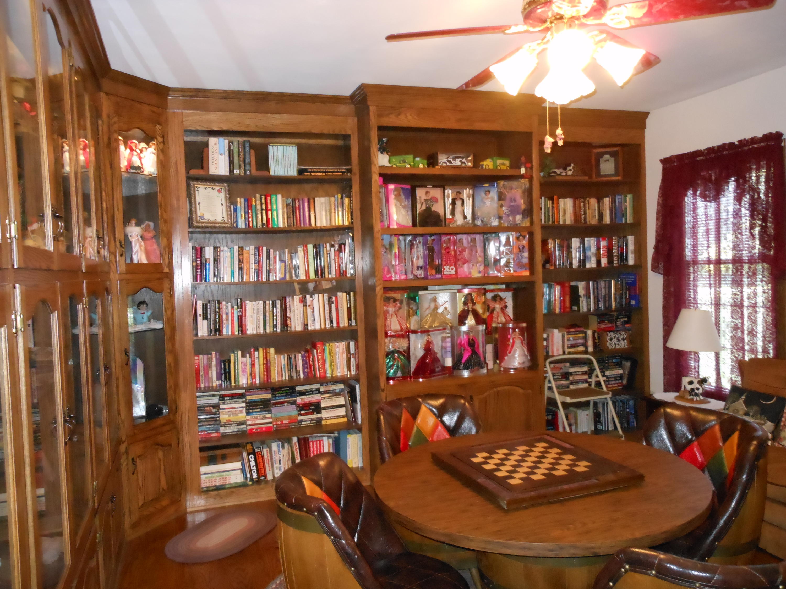 4019 Goodview Road Goodview, VA 24095 - Photo 17 of 47 a room with furniture and book shelf