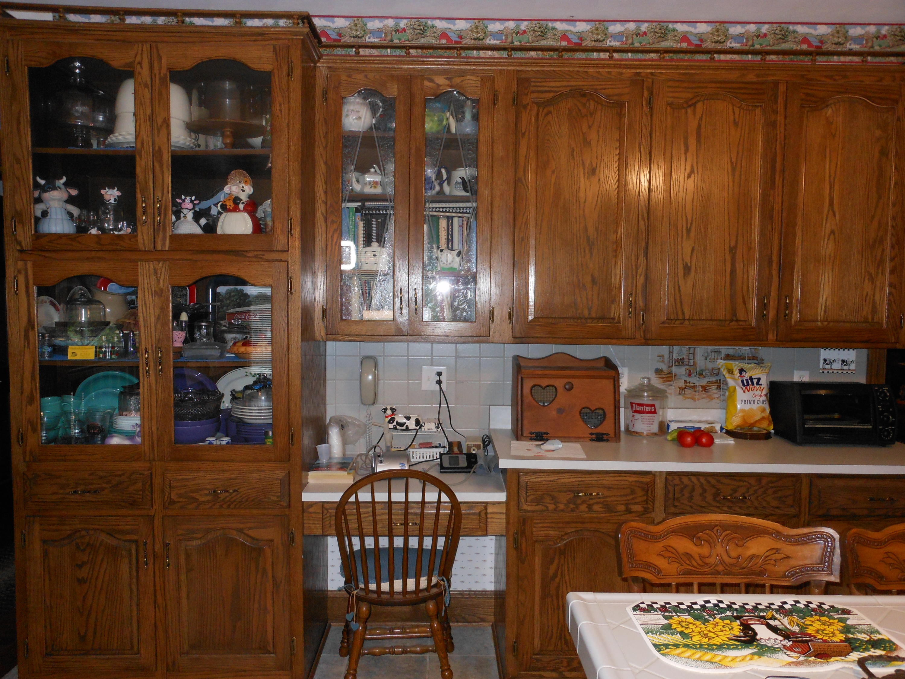 4019 Goodview Road Goodview, VA 24095 - Photo 21 of 47 a kitchen with a refrigerator and cabinets