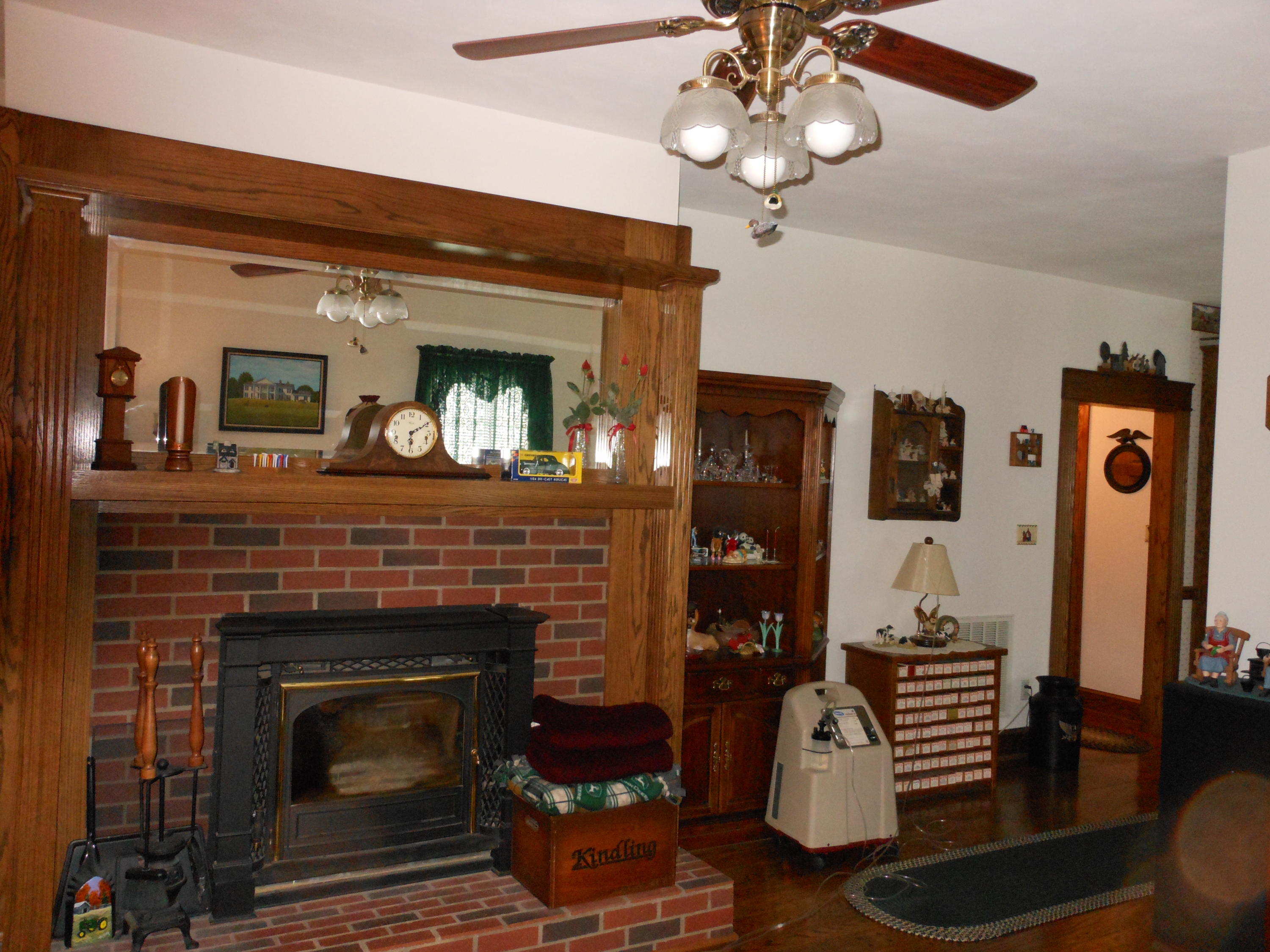 4019 Goodview Road Goodview, VA 24095 - Photo 26 of 47 a living room with furniture and a fireplace
