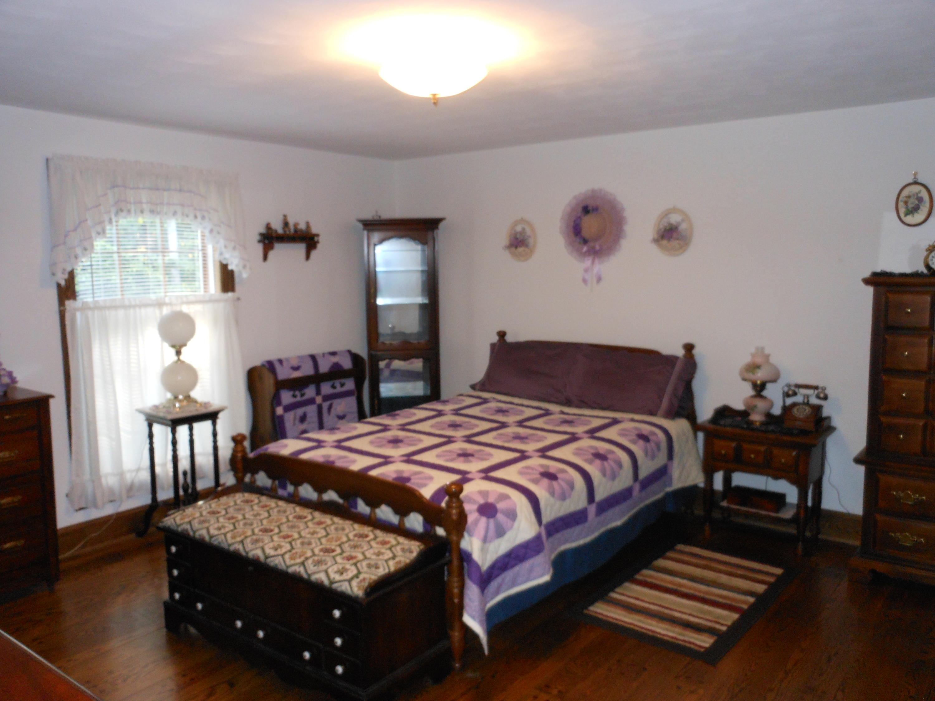 4019 Goodview Road Goodview, VA 24095 - Photo 38 of 47 a bedroom with a bed and window