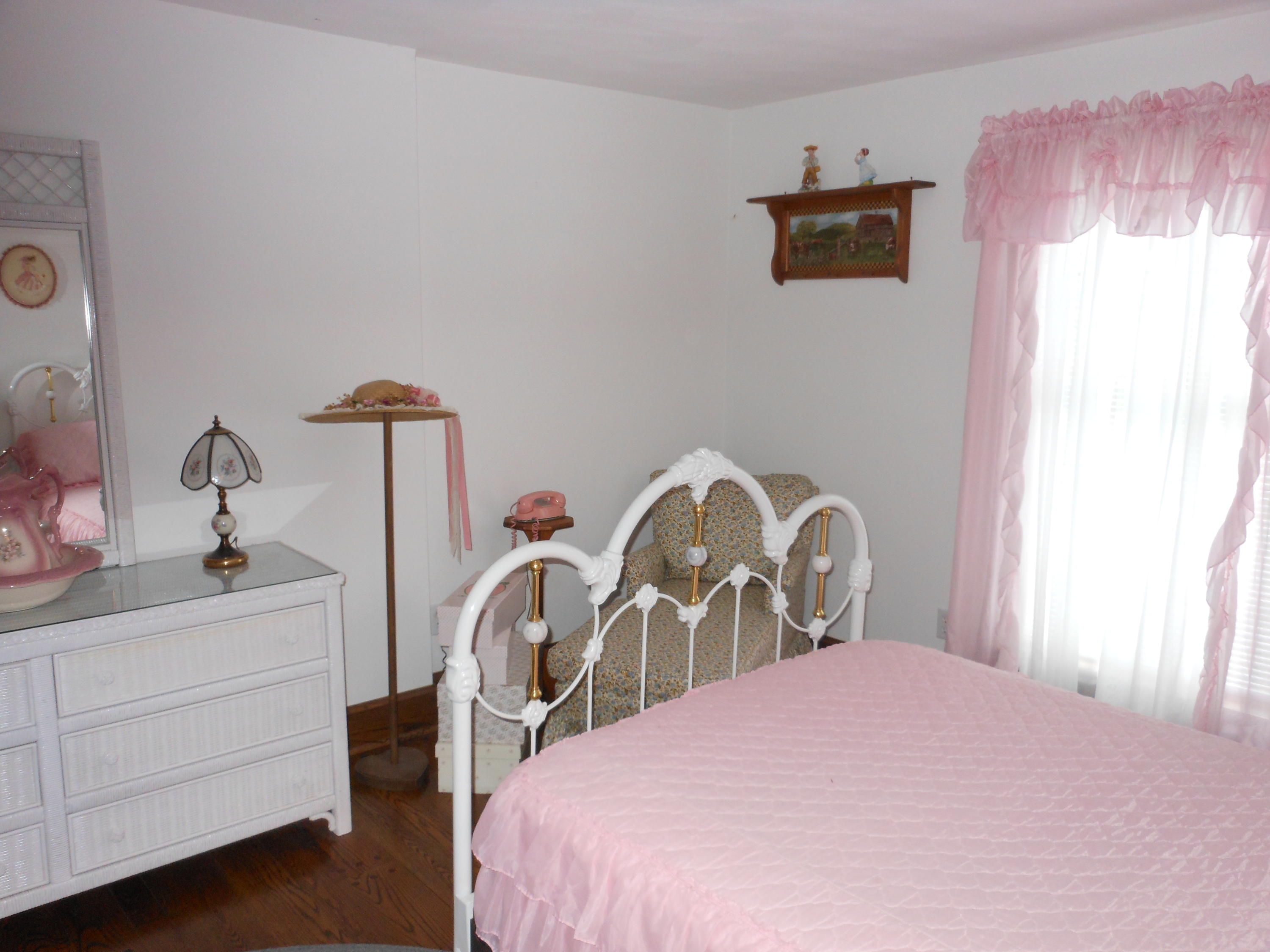 4019 Goodview Road Goodview, VA 24095 - Photo 40 of 47 a bedroom with a bed and with a table in it