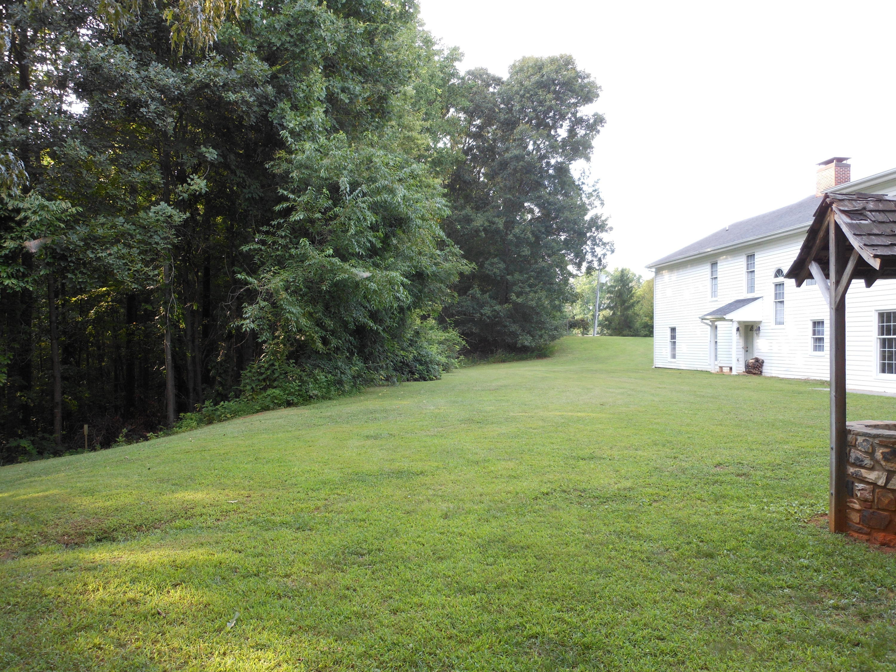 4019 Goodview Road Goodview, VA 24095 - Photo 10 of 47 a view of a backyard with a garden