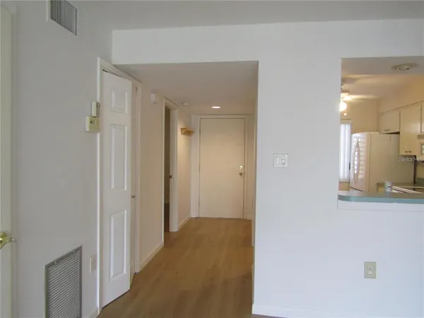 a view of a bathroom from a hallway
