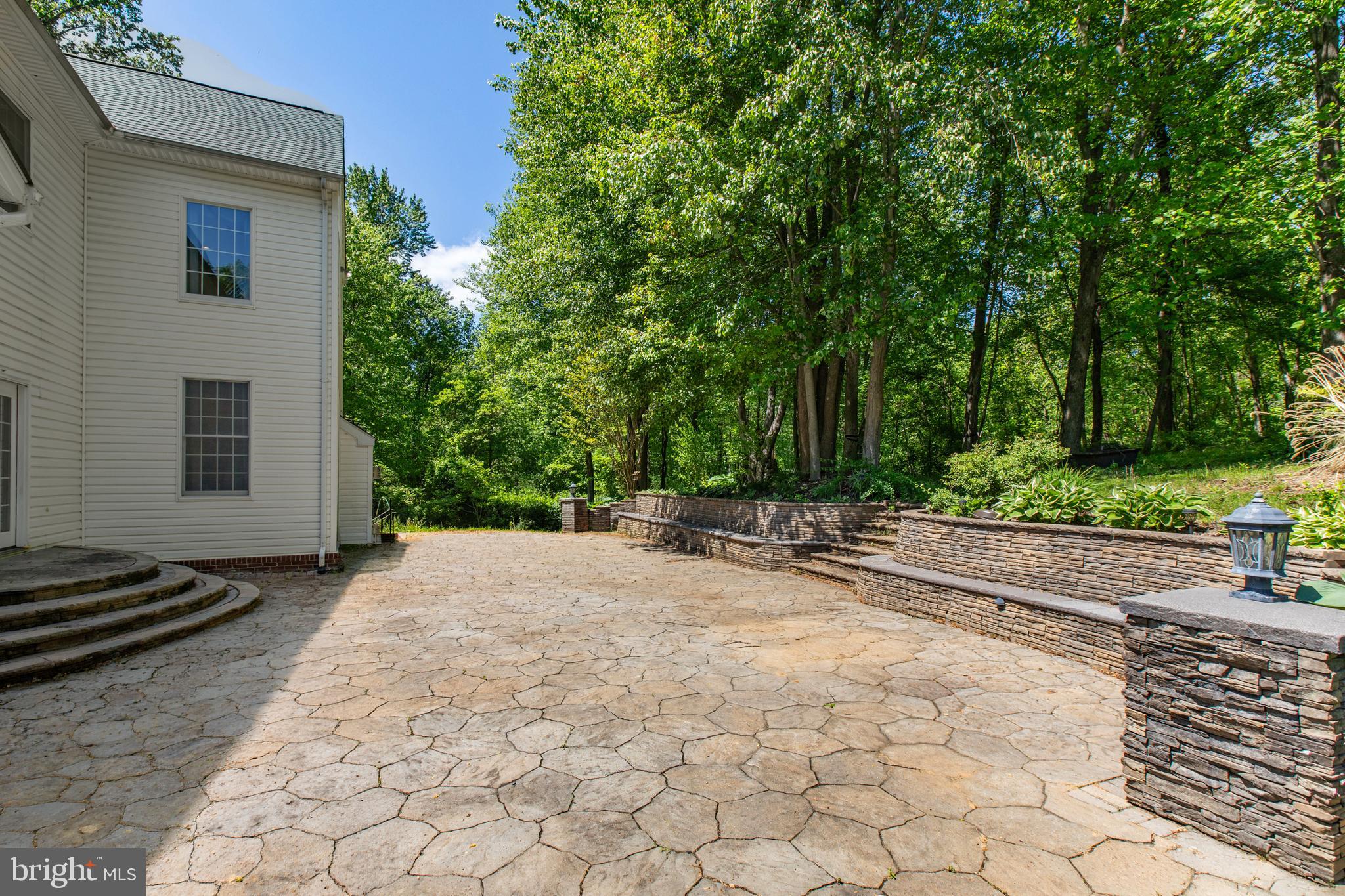 1601 Rushing Stream Court Forest Hill, MD 21050 - Photo 5 of 72 Patio with hardscaping - retaining wall w/ seats