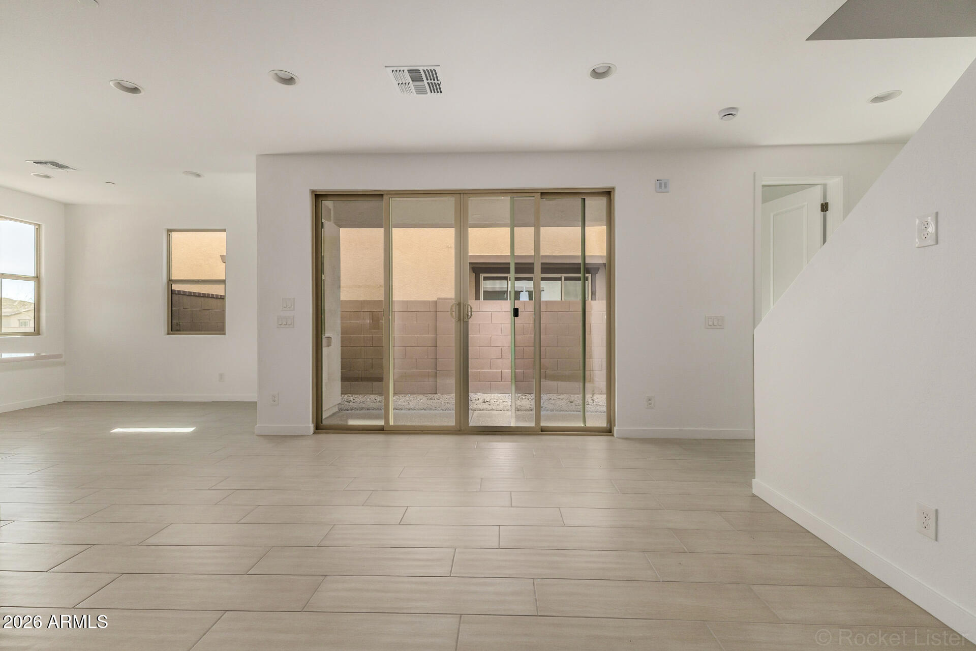 20618 West Thomas Road Buckeye, AZ 85396 - Photo 8 of 38 a view of an empty room with glass door