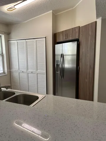 a view of a room with a large window