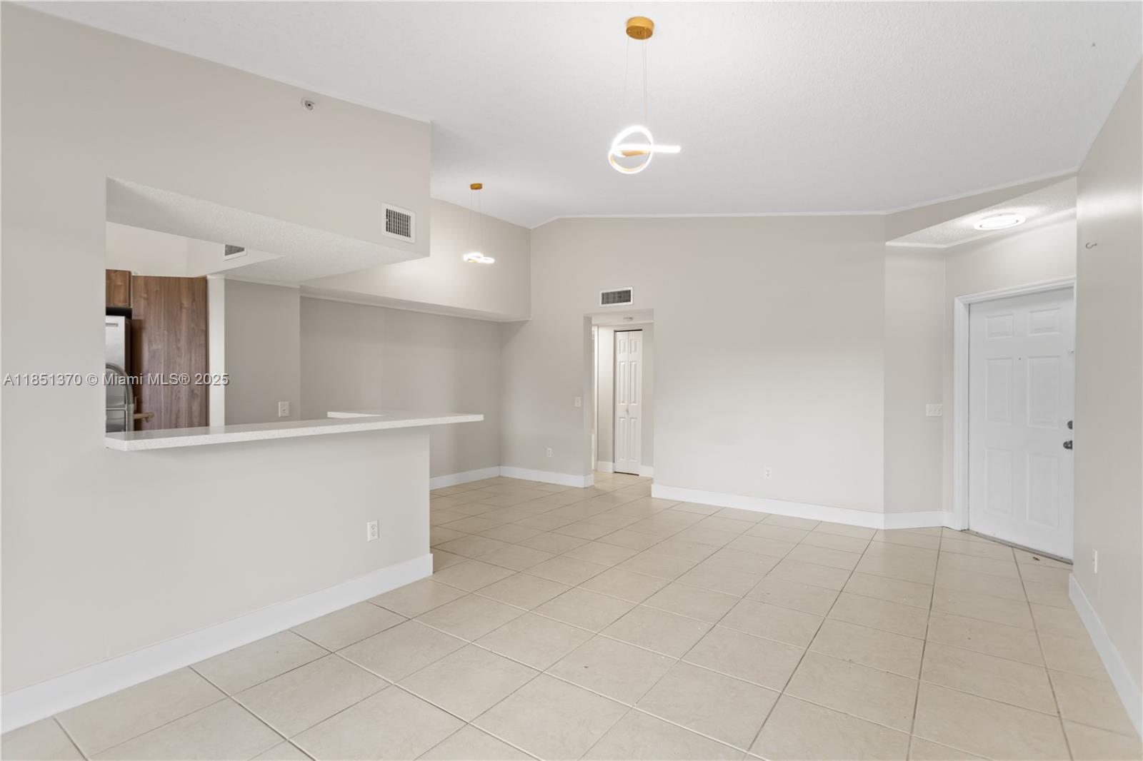 9645 Northwest 1st Court, Unit 1209 Pembroke Pines, FL 33024 - Photo 18 of 70 a view of an empty room