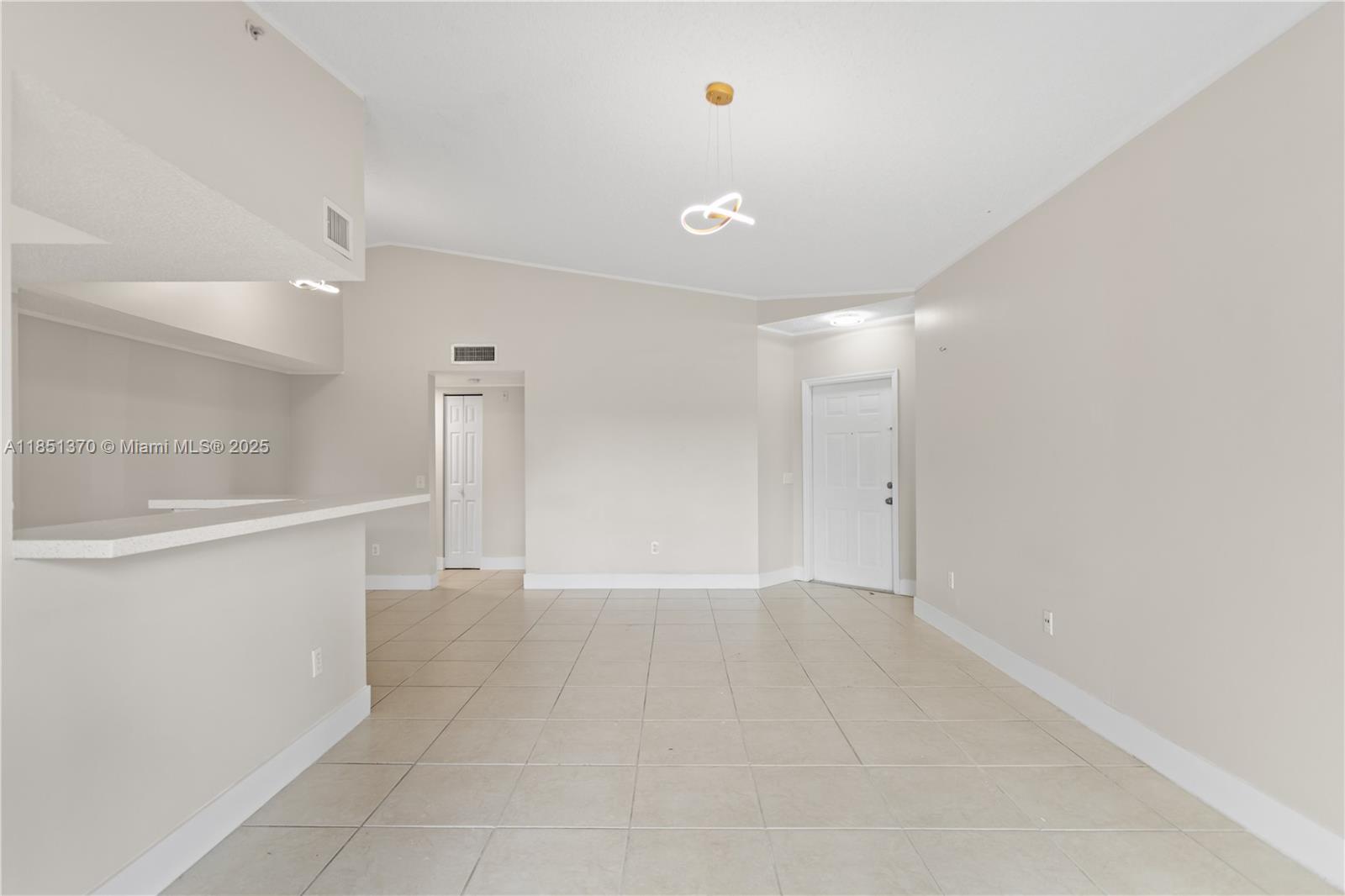9645 Northwest 1st Court, Unit 1209 Pembroke Pines, FL 33024 - Photo 19 of 70 wooden floor in an empty room with a window