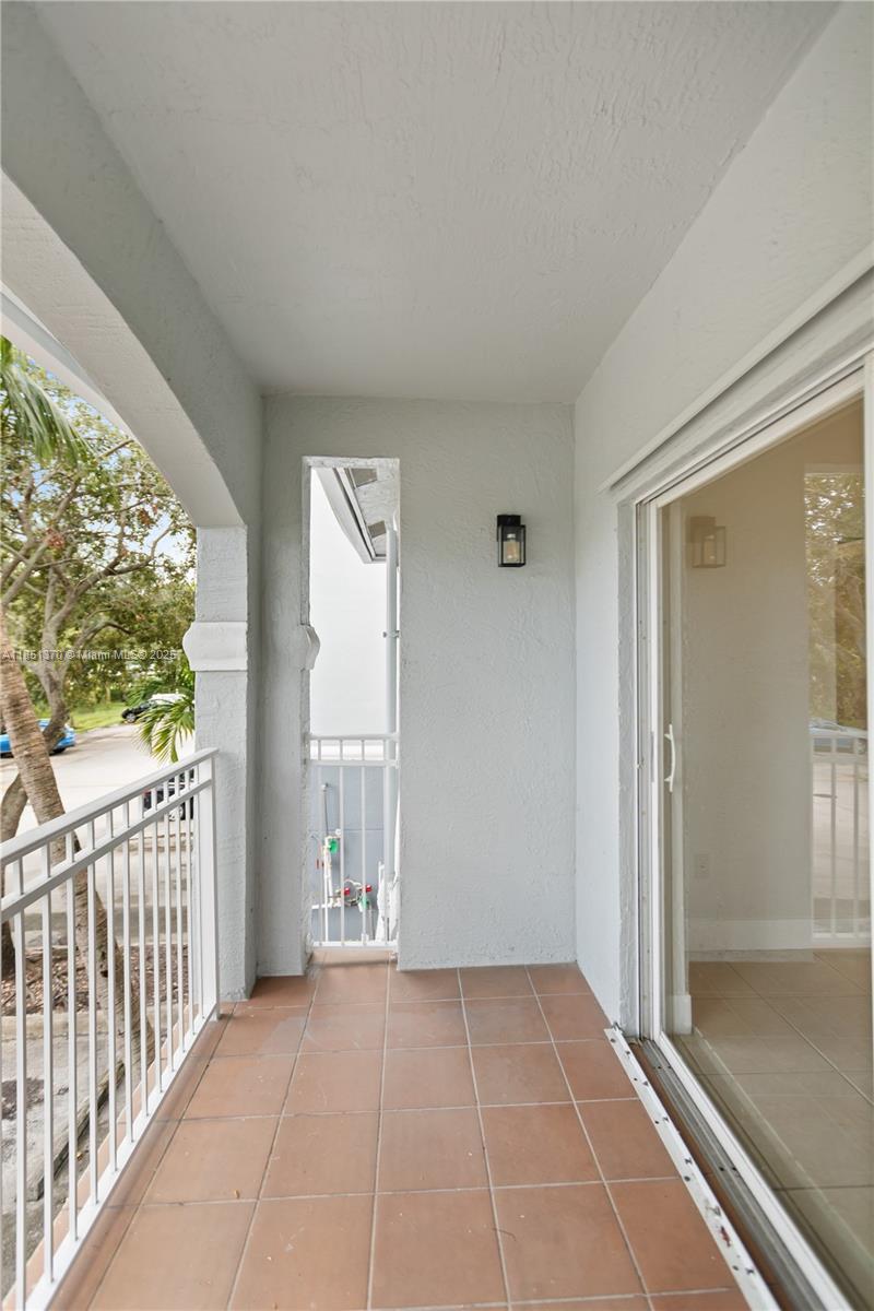 9645 Northwest 1st Court, Unit 1209 Pembroke Pines, FL 33024 - Photo 21 of 70 a view of a room with a large window