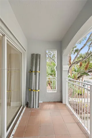 a kitchen with a sink cabinets and window
