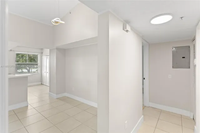 a bathroom with a sink toilet vanity and shower