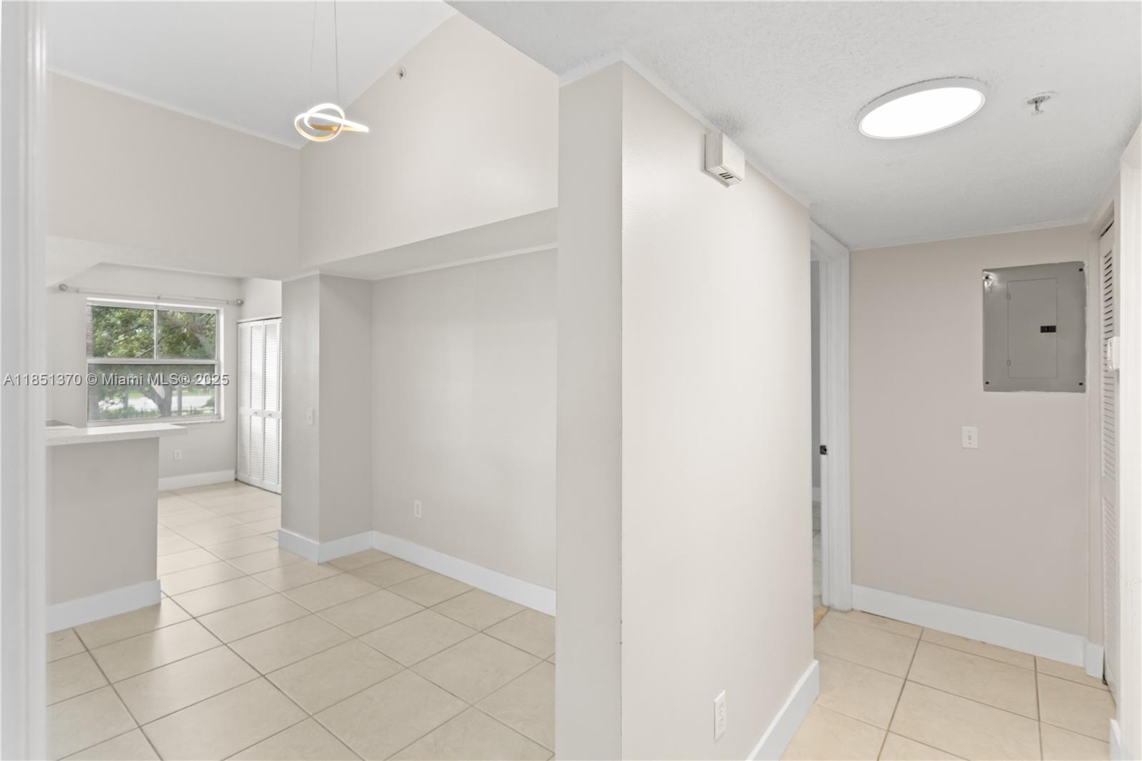 9645 Northwest 1st Court, Unit 1209 Pembroke Pines, FL 33024 - Photo 41 of 70 a view of an empty room