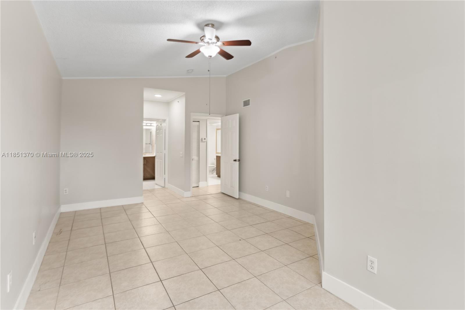 9645 Northwest 1st Court, Unit 1209 Pembroke Pines, FL 33024 - Photo 50 of 70 a view of an empty room with a window