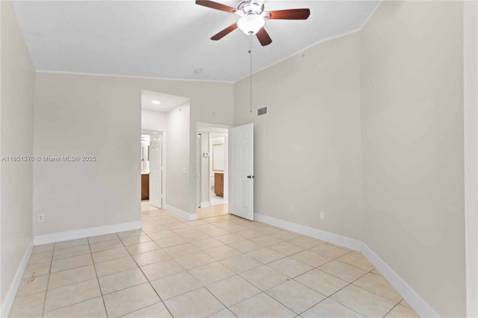 9645 Northwest 1st Court, Unit 1209 Pembroke Pines, FL 33024 - Photo 51 of 70 wooden floor in an empty room