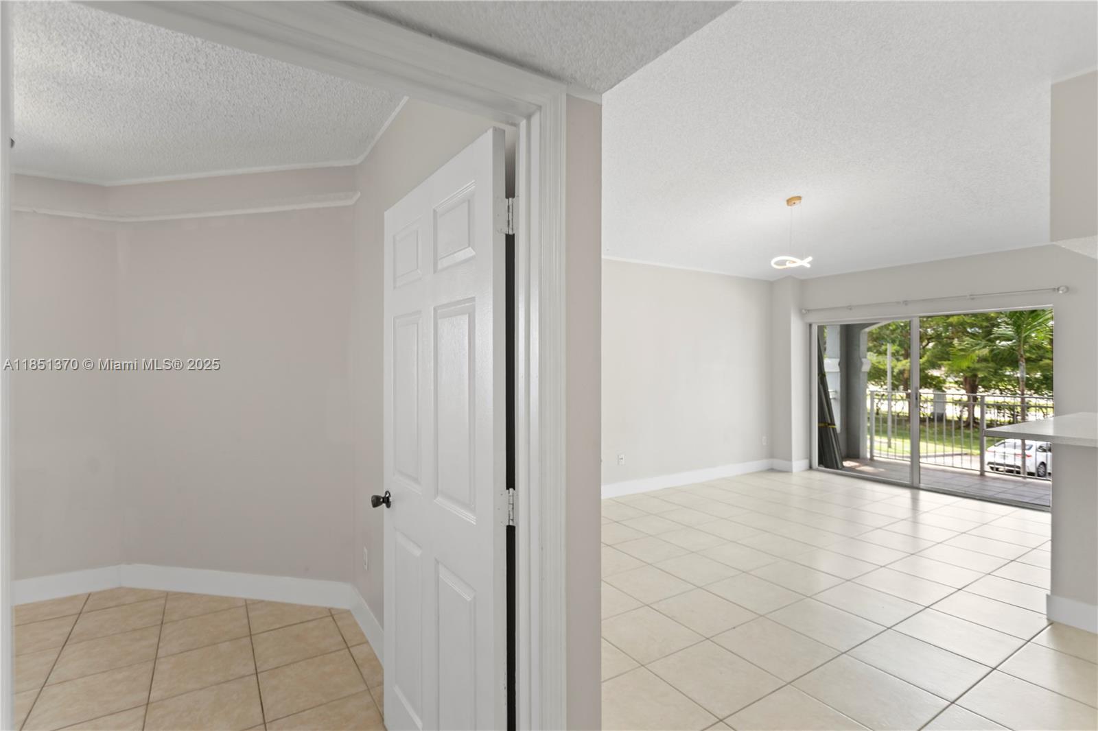 9645 Northwest 1st Court, Unit 1209 Pembroke Pines, FL 33024 - Photo 57 of 70 a view of an entryway with wooden floor
