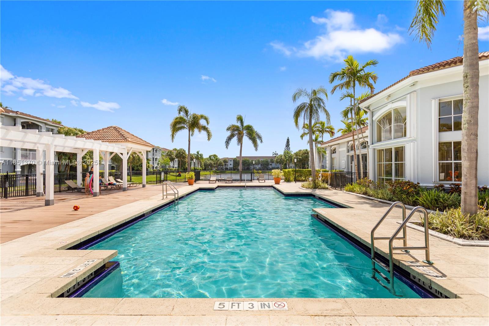 9645 Northwest 1st Court, Unit 1209 Pembroke Pines, FL 33024 - Photo 65 of 70 a view of a house with swimming pool