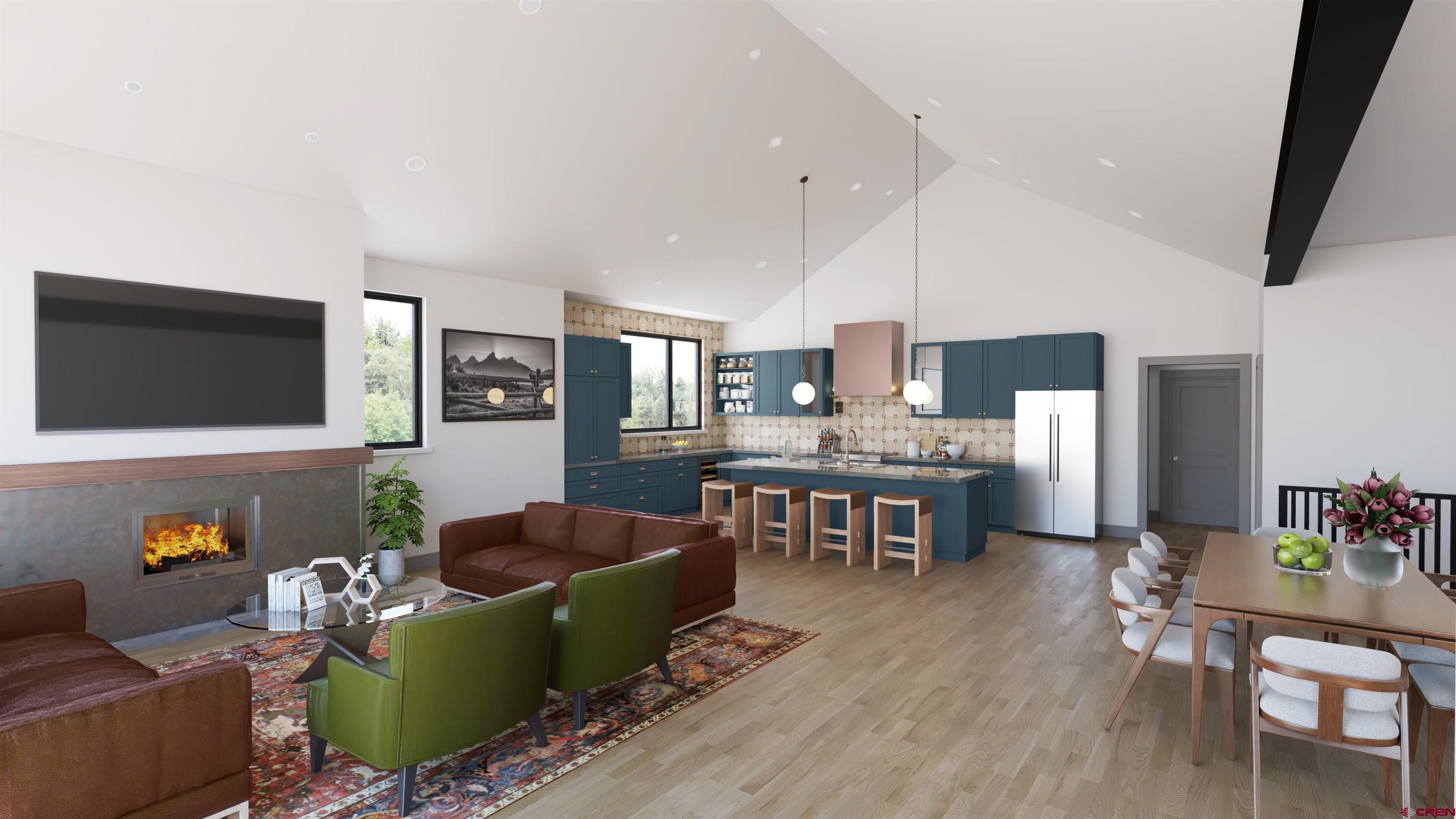 180 Elk Valley Road, Unit 118 Crested Butte, CO 81224 - Photo 19 of 26 a living room with furniture and a flat screen tv