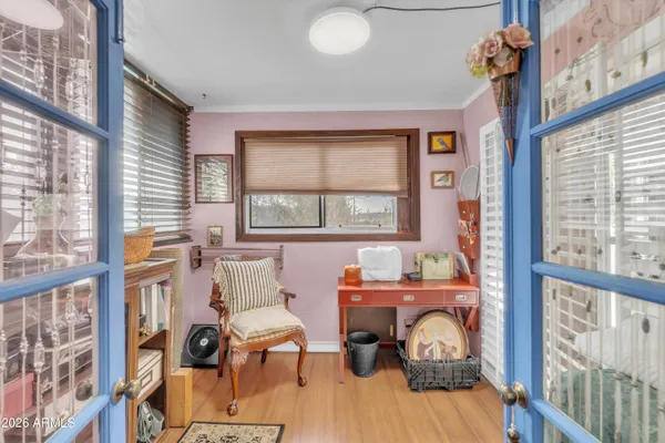 a room with furniture and a window