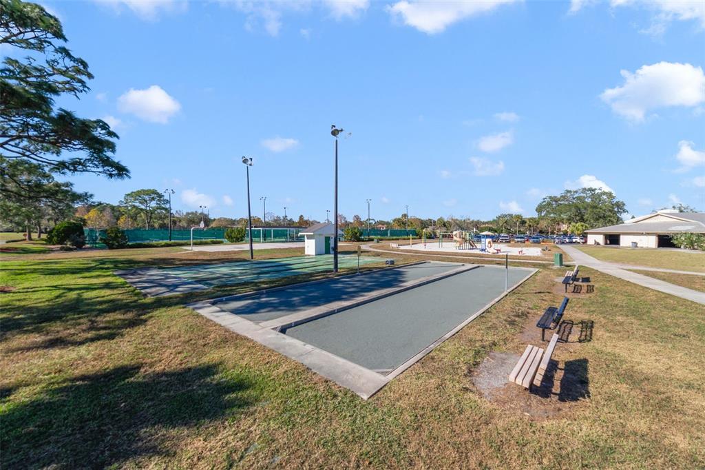 3908 Atrium Drive, Unit L5 Orlando, FL 32822 - Photo 16 of 17 a view of a swimming pool and a yard