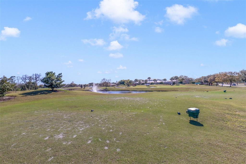 3908 Atrium Drive, Unit L5 Orlando, FL 32822 - Photo 17 of 17 a view of a lake in middle of the town