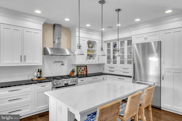 a white toilet sitting next to a shower curtain