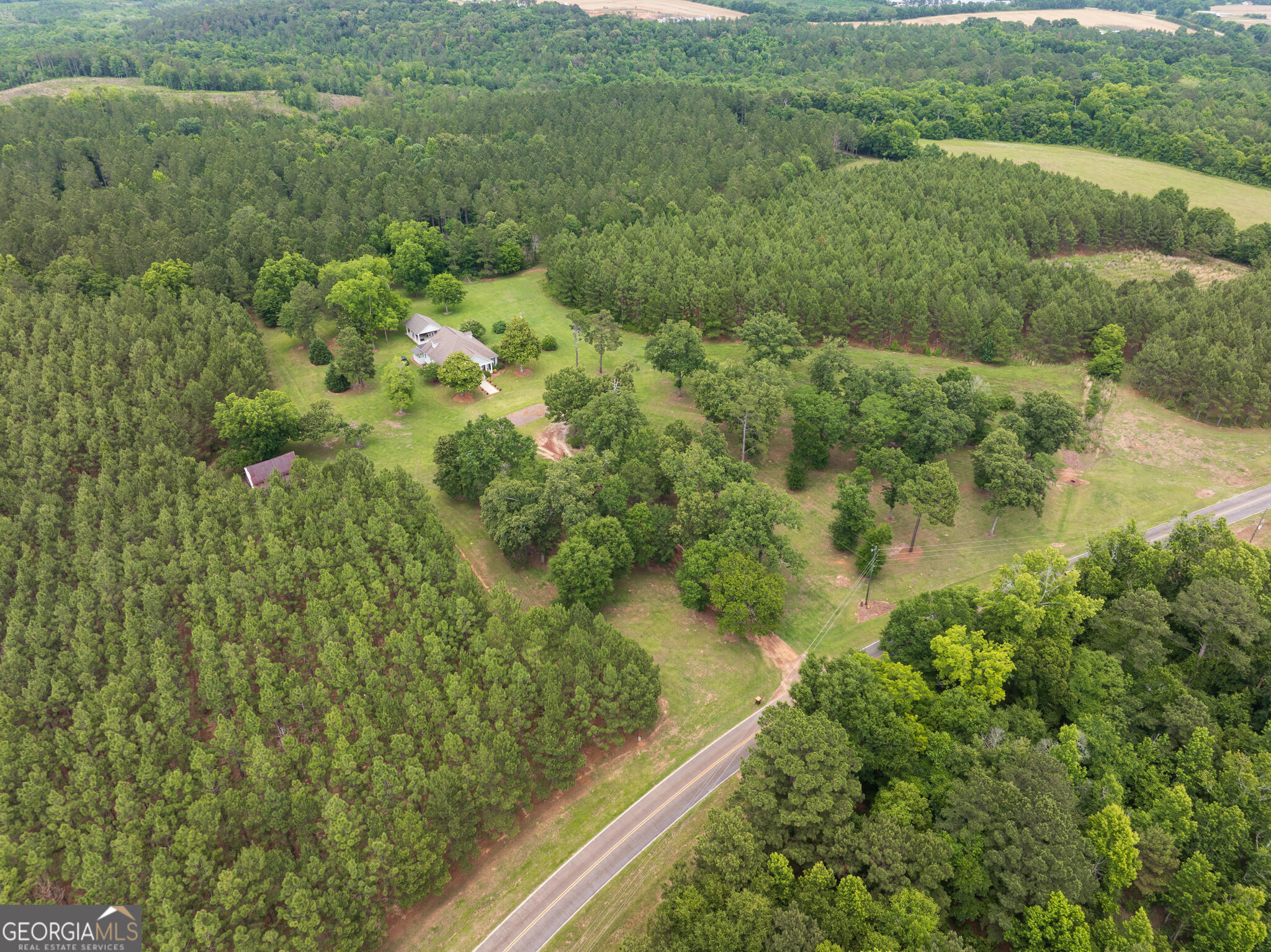 1859 Upper River Road Americus, GA 31709 - Photo 45 of 47 a view of a garden with a lake