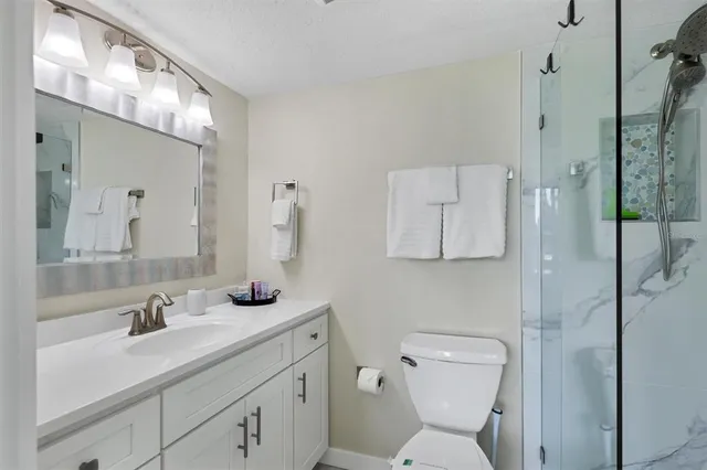 a view of walk in closet with window