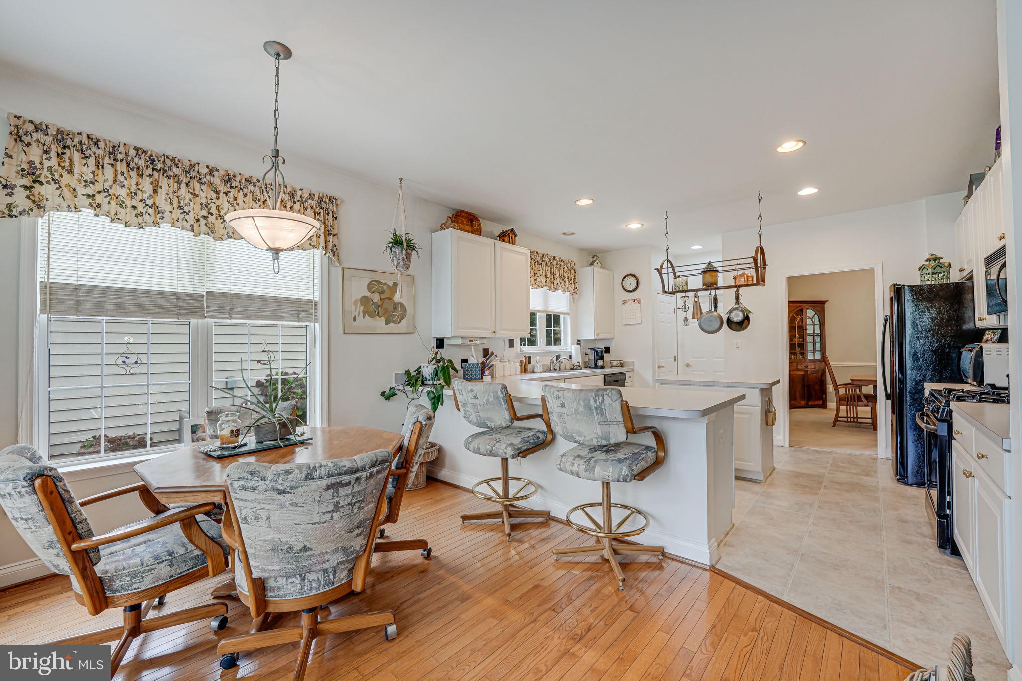6717 Buglecall Place Gainesville, VA 20155 - Photo 12 of 44 Another Angle of Breakfast Room into Kitchen