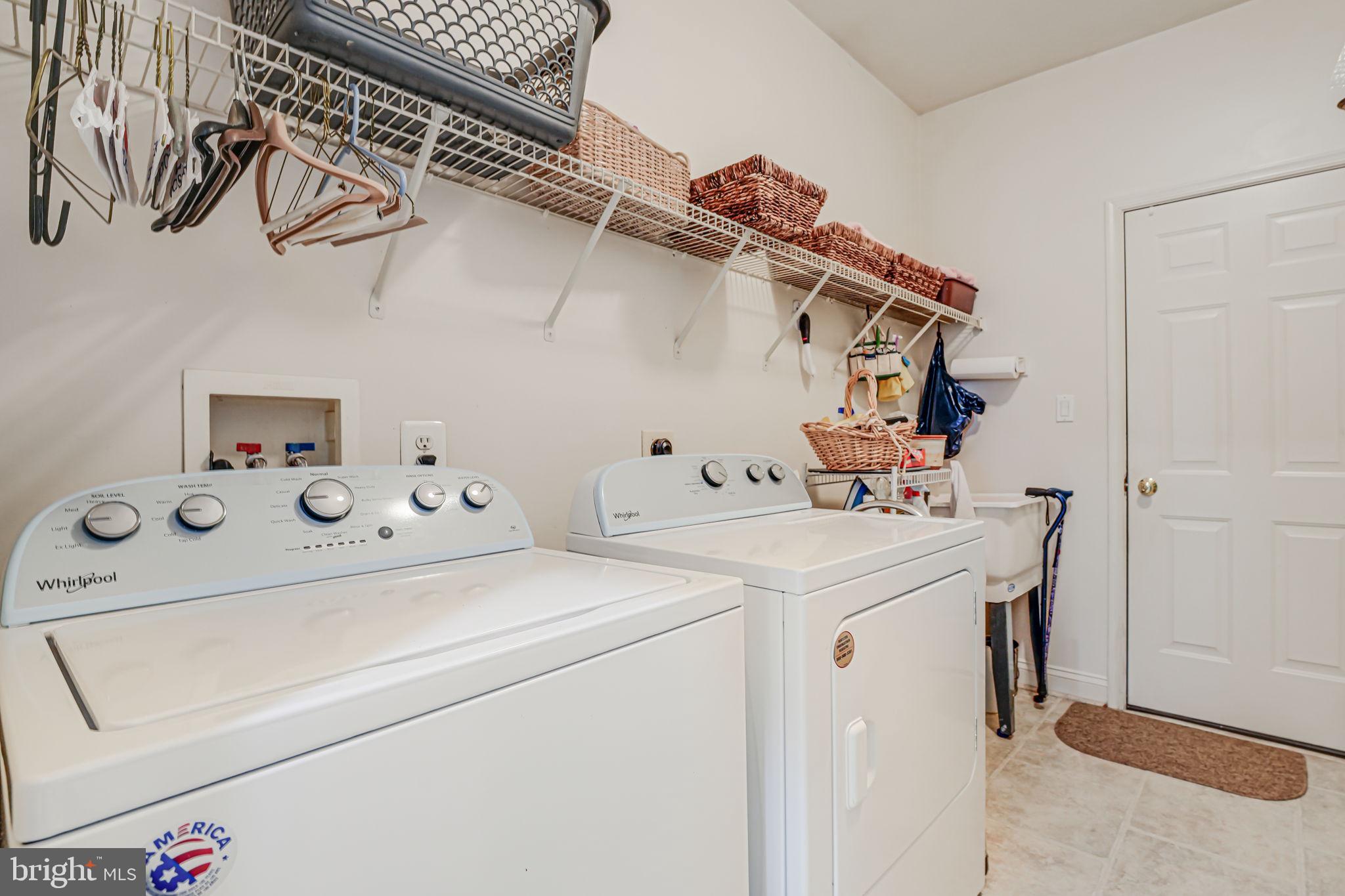 6717 Buglecall Place Gainesville, VA 20155 - Photo 24 of 44 Laundry/mud Room off the Garage