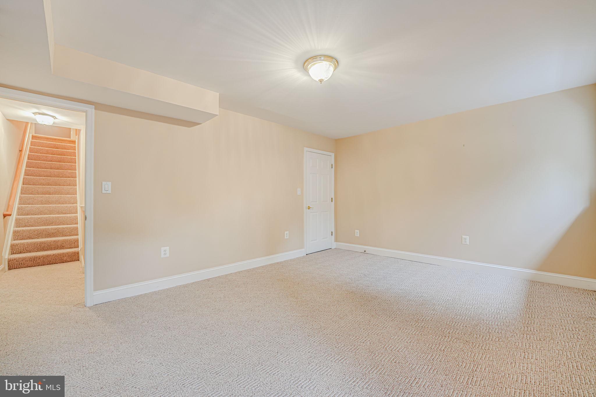 6717 Buglecall Place Gainesville, VA 20155 - Photo 31 of 44 Another Lower Level Angle