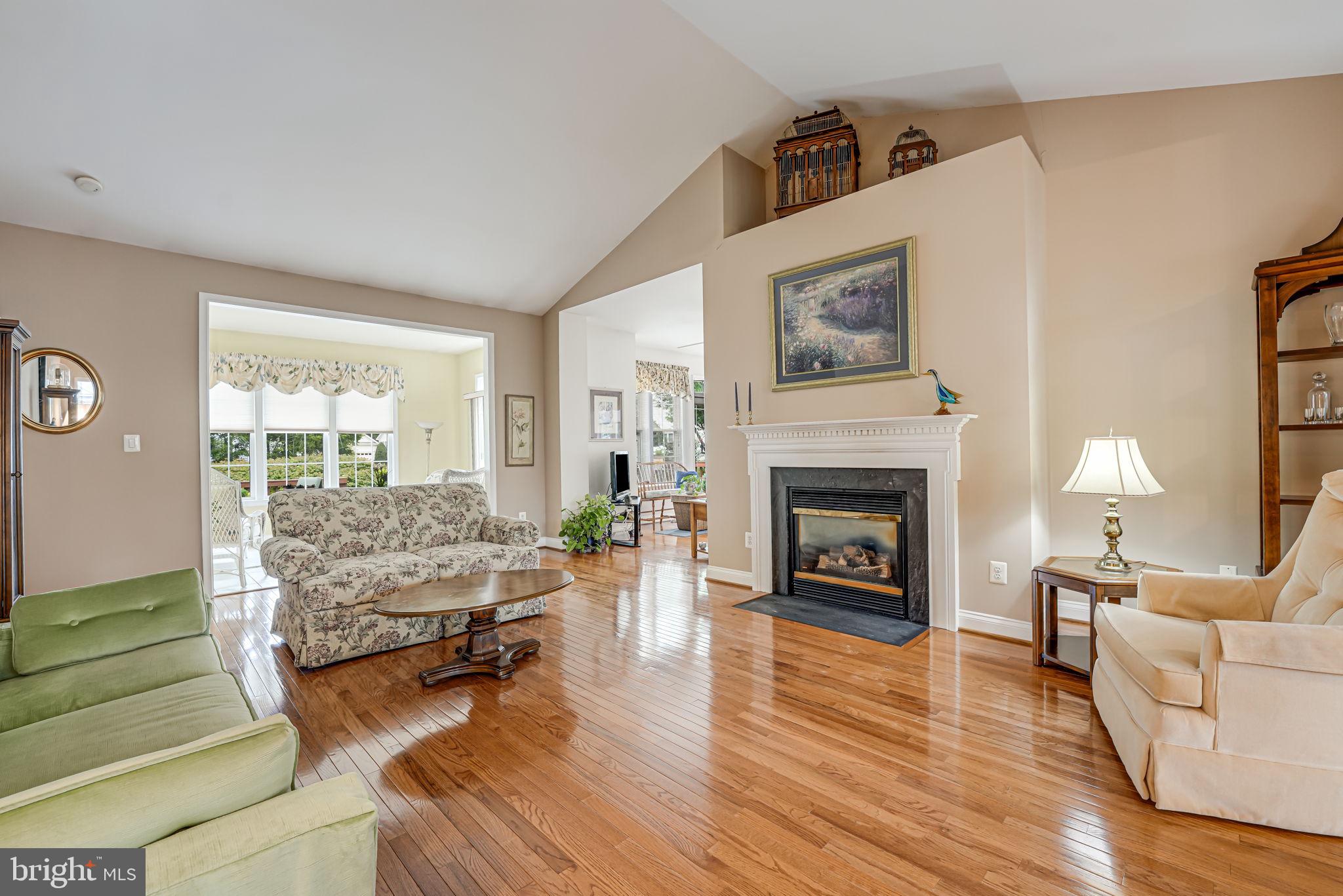 6717 Buglecall Place Gainesville, VA 20155 - Photo 6 of 44 Angle of Living Room toward Sun Room