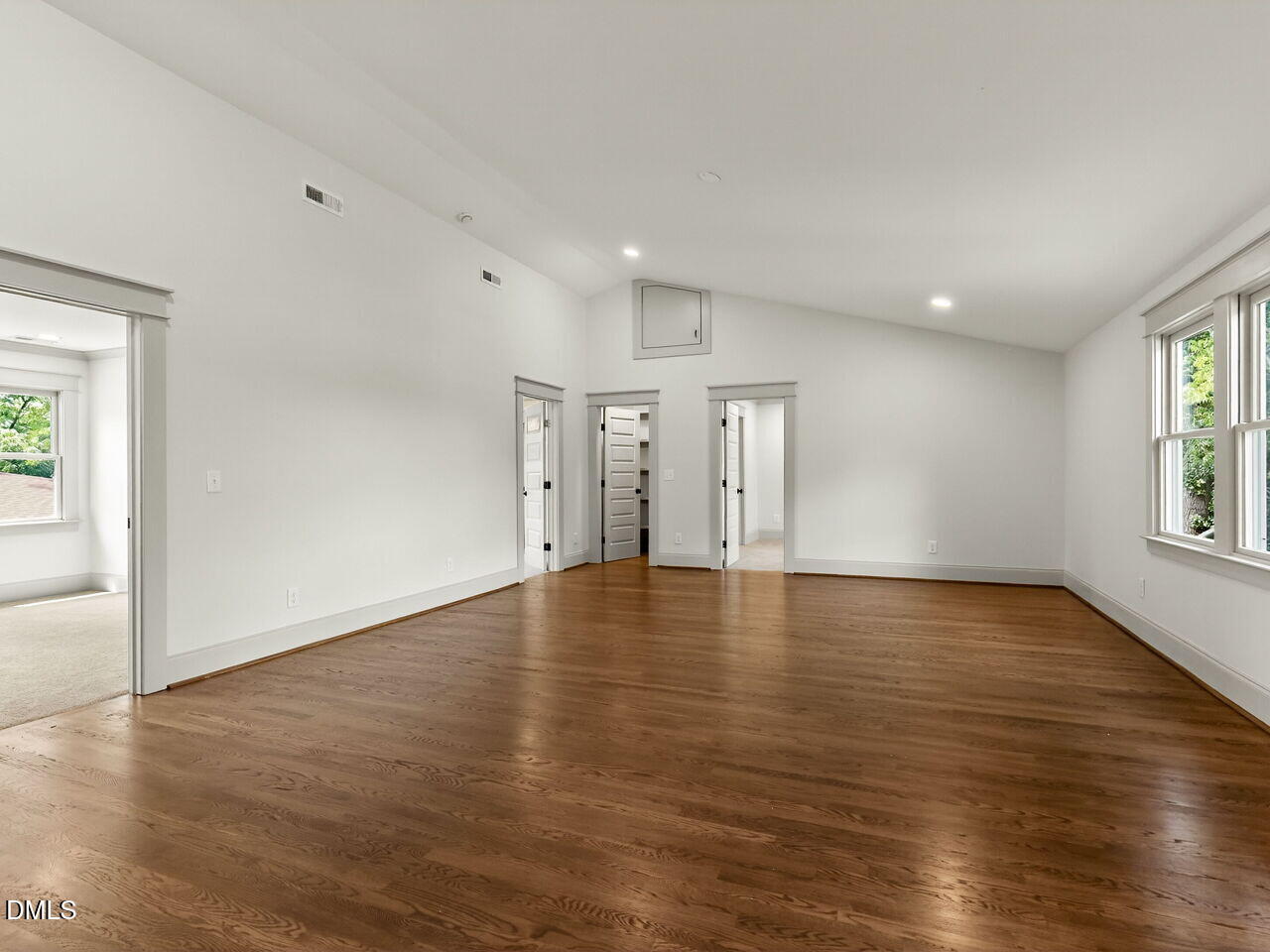 504 Tilden Street Raleigh, NC 27605 - Photo 40 of 58 a view of empty room with wooden floor and window