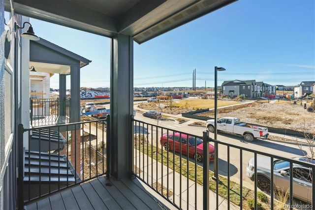 a bathroom with a sink a toilet a mirror a bathtub and shower