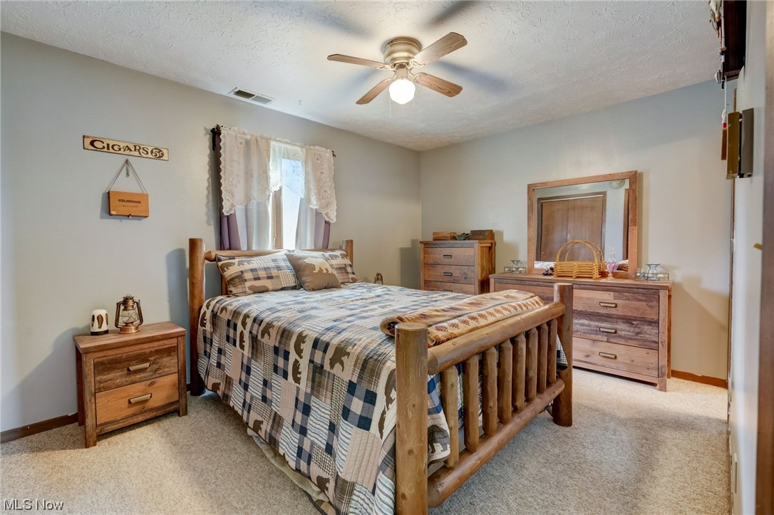 10085 Franchester Road Burbank, OH 44214 - Photo 10 of 40 Bedroom 1 with ceiling fan