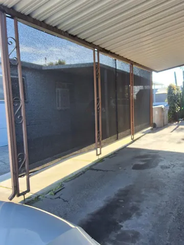 a view of backyard with tub