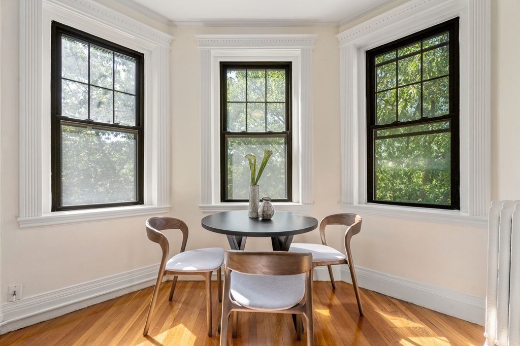 384 Riverway, Unit 5 Boston, MA 02115 - Photo 3 of 20 a dining room with furniture and window