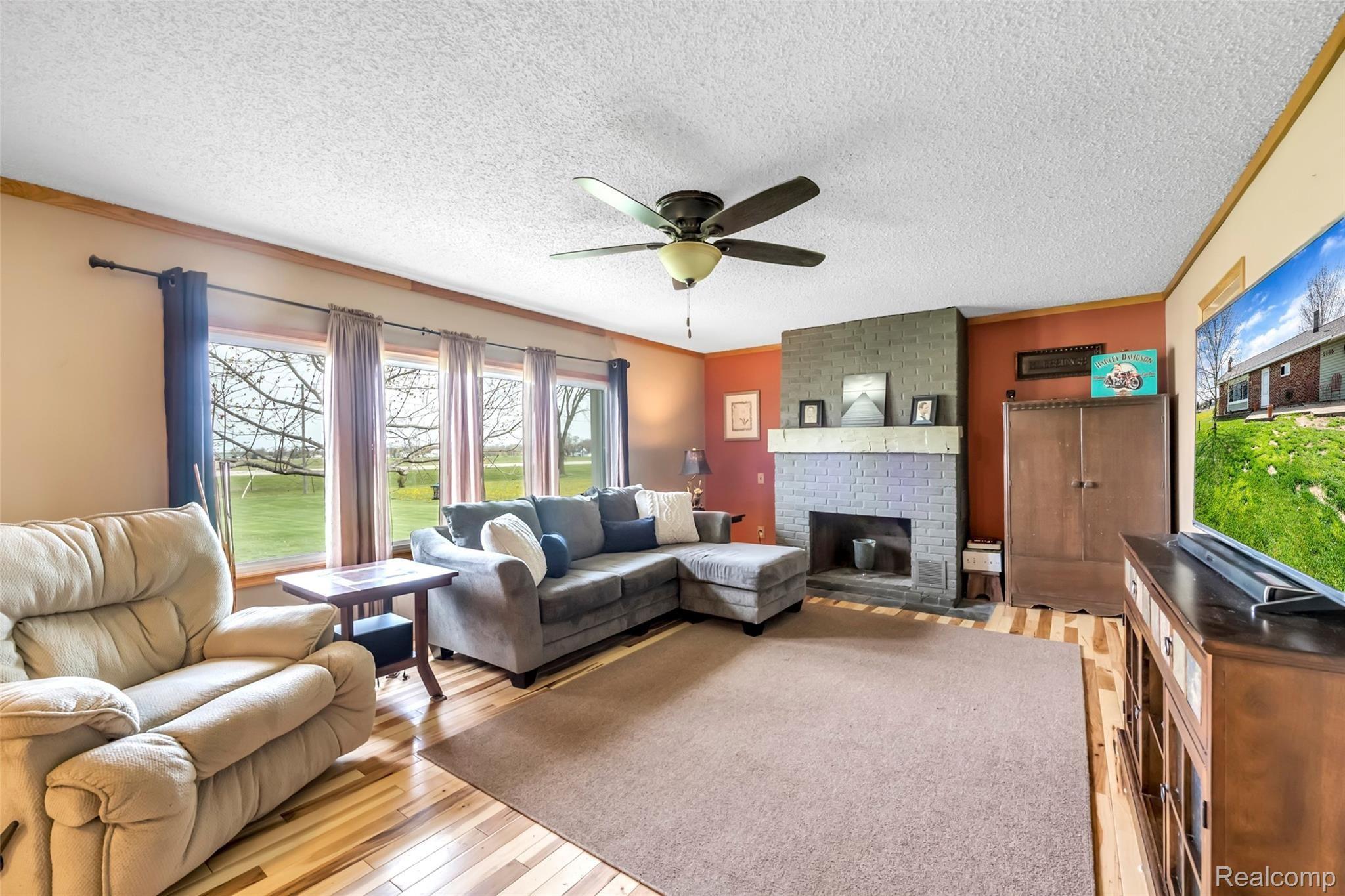 2185 Peet Road New Lothrop, MI 48460 - Photo 3 of 29 Large Picture Windows Let The Sunshine In!