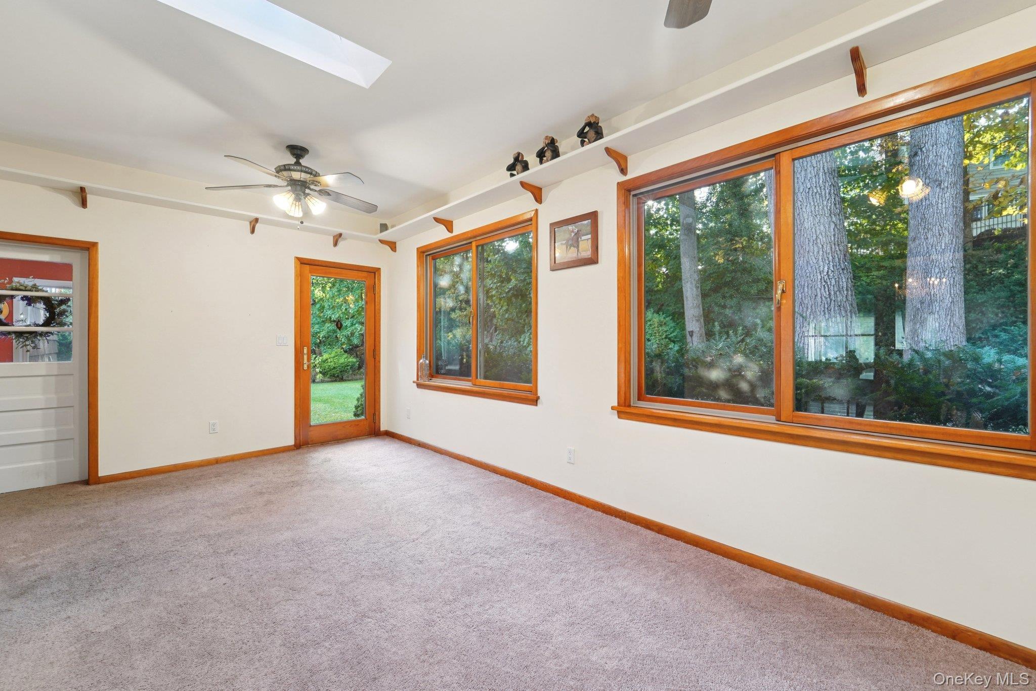 24 Pamela Lane New Rochelle, NY 10804 - Photo 12 of 34 an empty room with windows and outdoor view