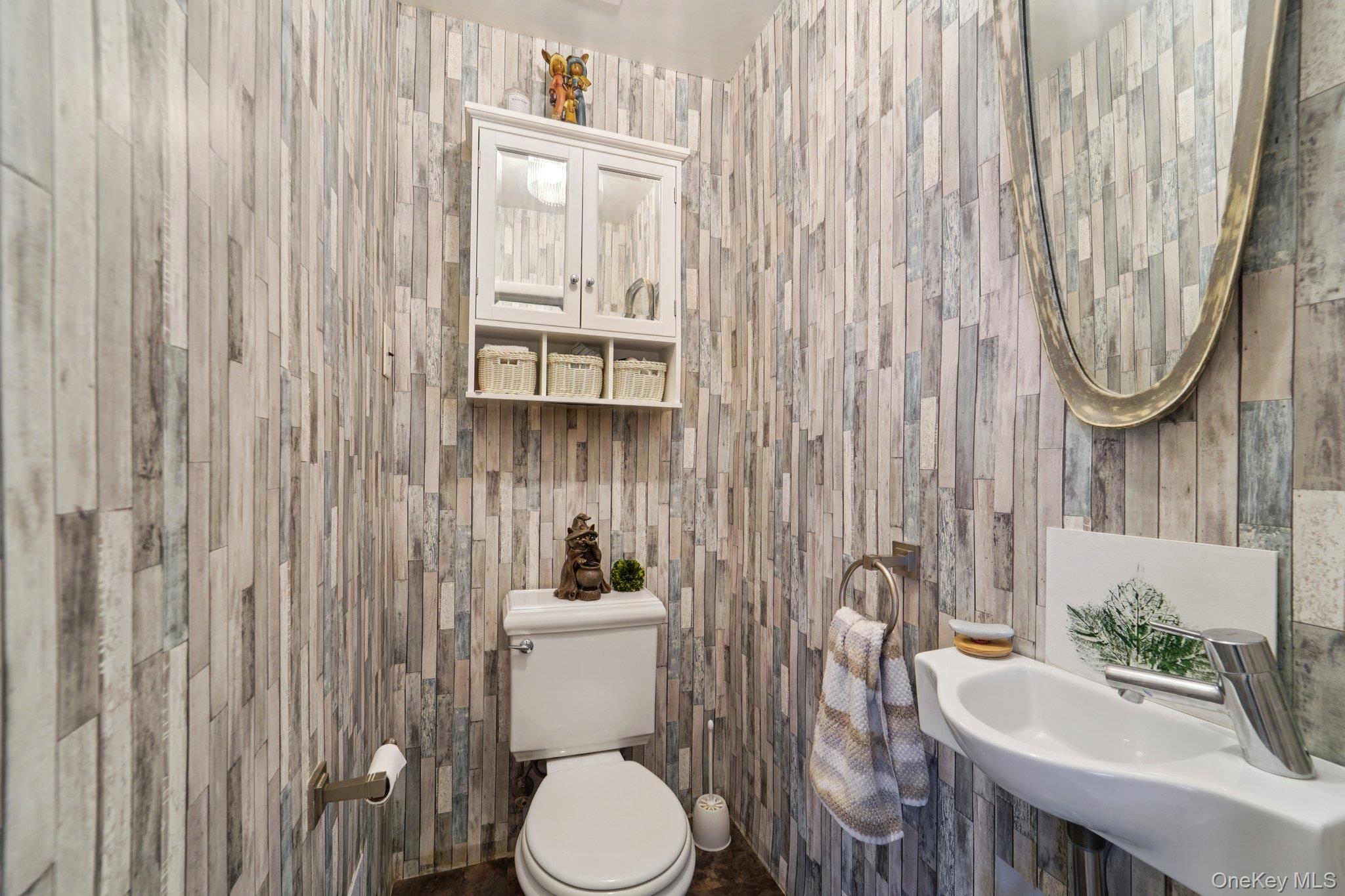 24 Pamela Lane New Rochelle, NY 10804 - Photo 13 of 34 a bathroom with a toilet a sink and curtain