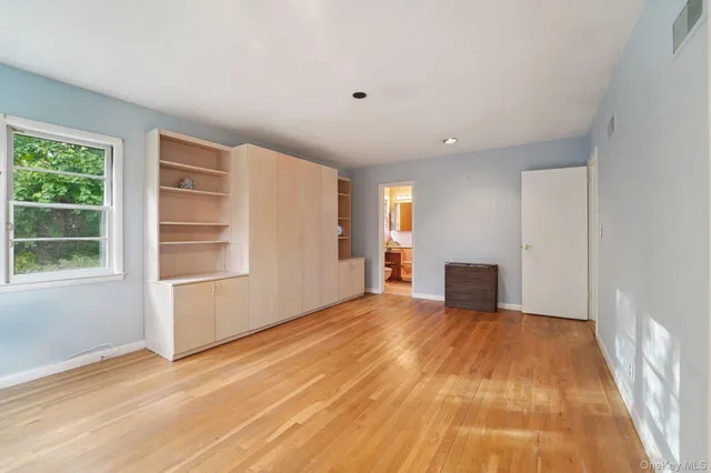 a children room with toys and a wooden floor