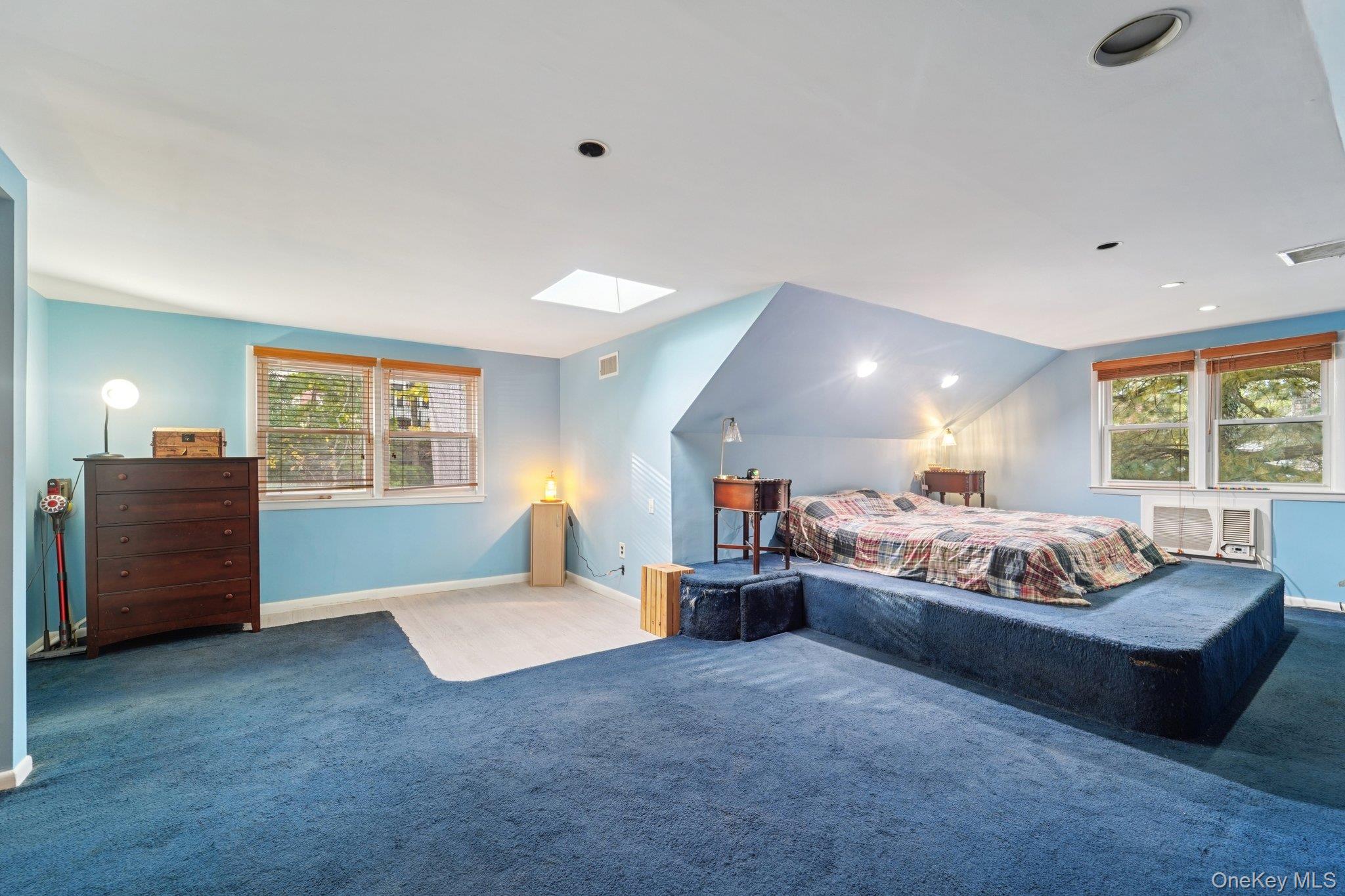 24 Pamela Lane New Rochelle, NY 10804 - Photo 20 of 34 a living room with furniture and a window