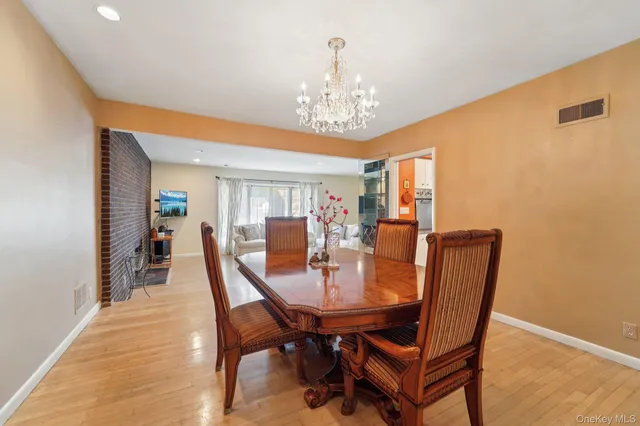 a kitchen with stainless steel appliances granite countertop a refrigerator and a stove