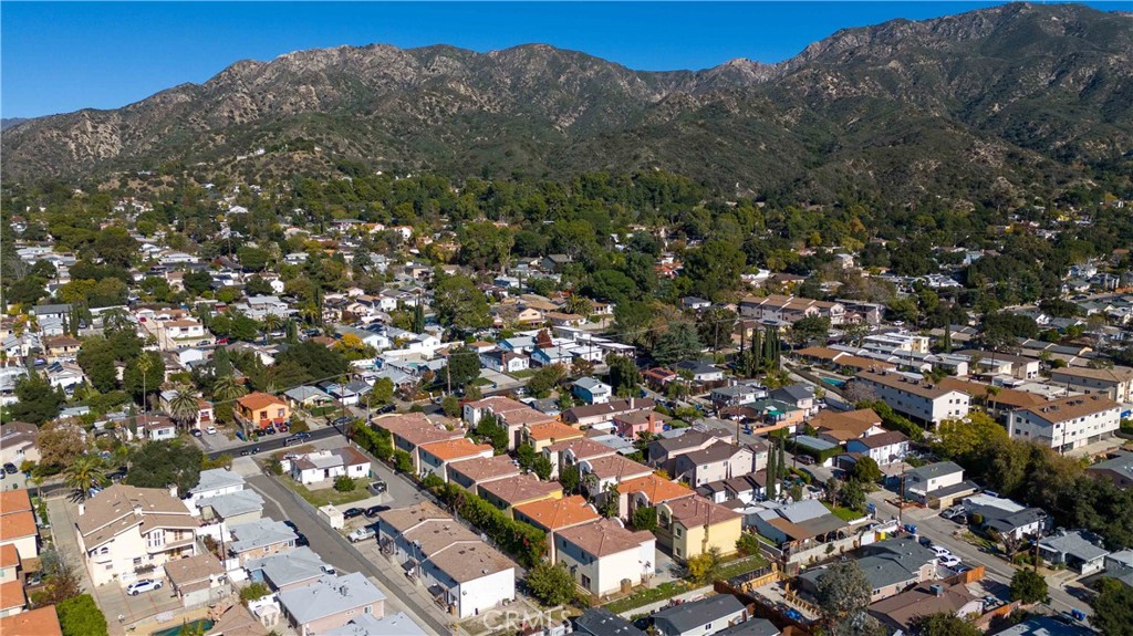 6920 Valmont Street, Unit 5 Tujunga, CA 91042 - Photo 11 of 69 an aerial view of residential houses with outdoor space and trees