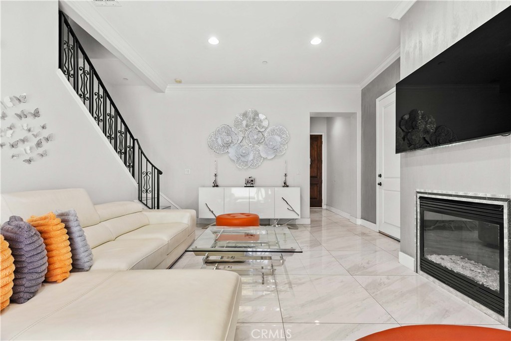 6920 Valmont Street, Unit 5 Tujunga, CA 91042 - Photo 20 of 69 a living room with furniture and a fireplace