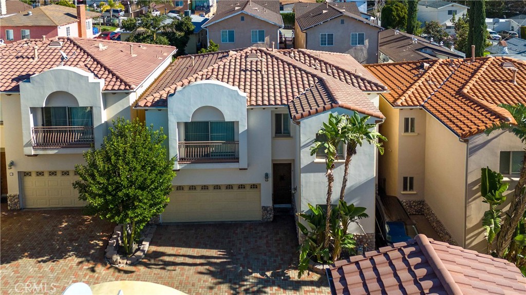 6920 Valmont Street, Unit 5 Tujunga, CA 91042 - Photo 2 of 69 a front view of a house with garden