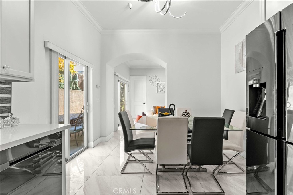 6920 Valmont Street, Unit 5 Tujunga, CA 91042 - Photo 28 of 69 a view of a dining room with furniture window and outside view