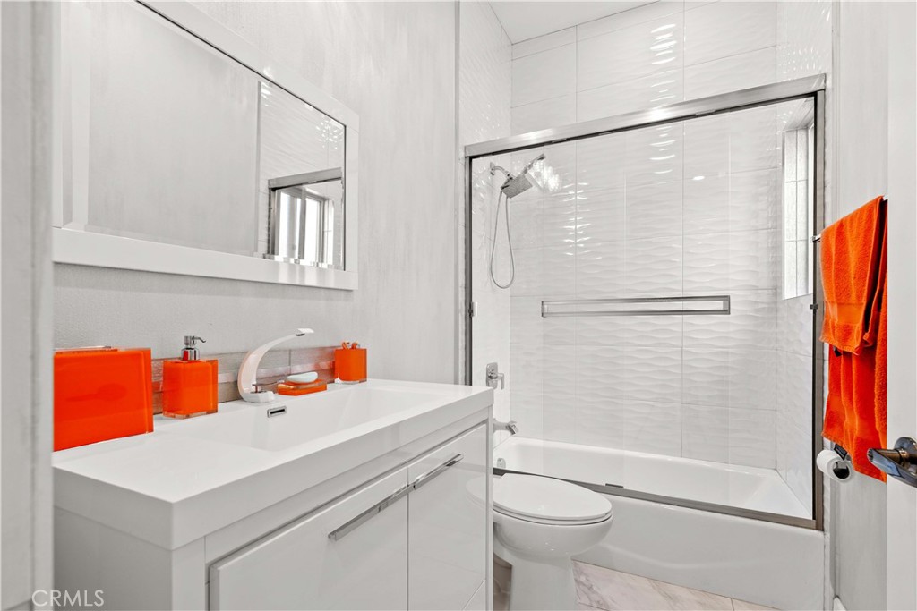 6920 Valmont Street, Unit 5 Tujunga, CA 91042 - Photo 37 of 69 a bathroom with a sink toilet and shower