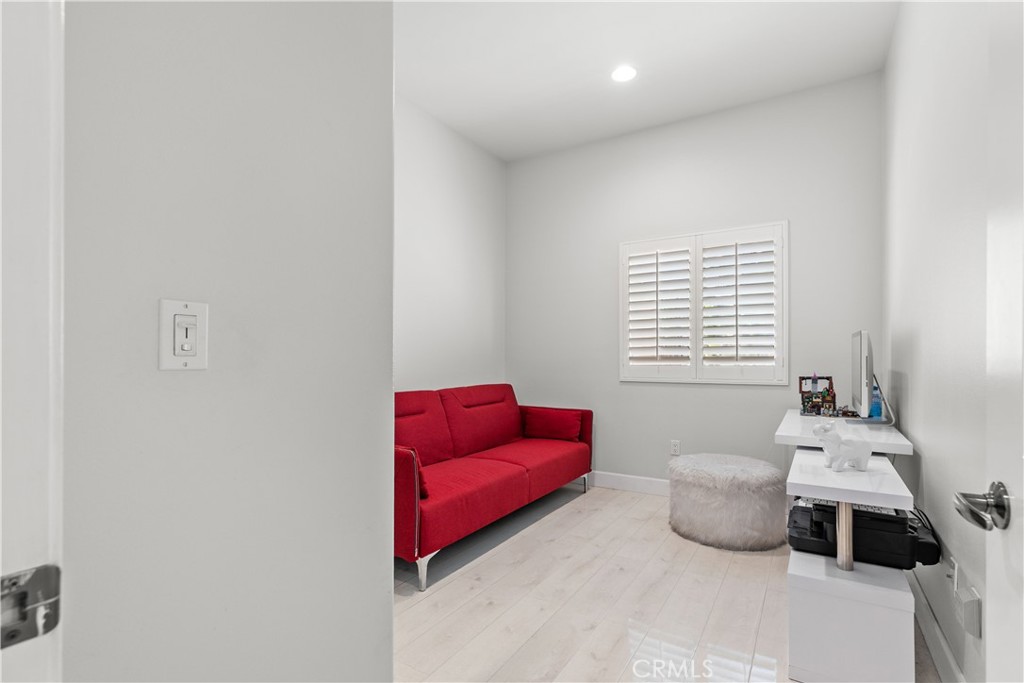 6920 Valmont Street, Unit 5 Tujunga, CA 91042 - Photo 39 of 69 a living room with furniture and a window